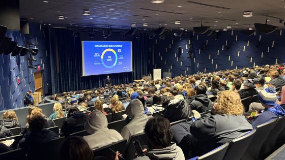 Students attend an in-person financial literacy session