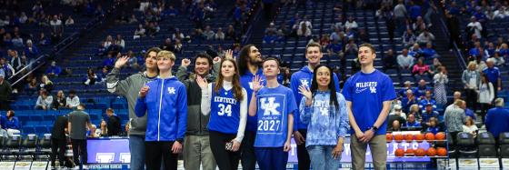 Photo of UK Invests student participants being recognized at center court of Rupp Arena