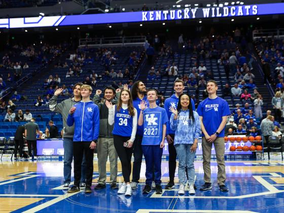 Photo of UK Invests student participants being recognized at center court of Rupp Arena